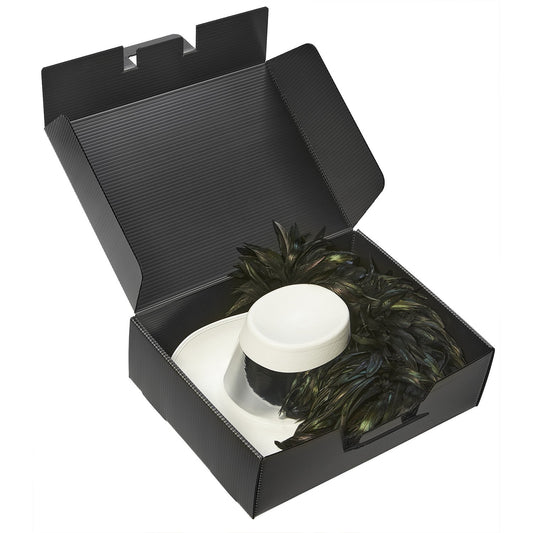 Clear cylindrical PlastiPak Aussie hat box with black base and lid, featuring molded interior supports and sturdy clip-lock closure—ideal for packing and protecting wide-brimmed hats.