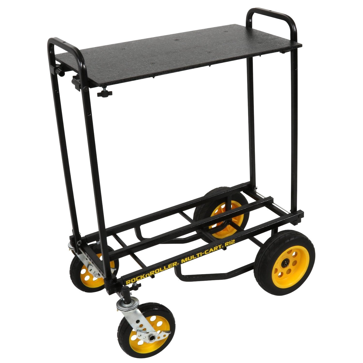 Black carpeted laptop/media shelf installed on a Rock N Roller R8/R10/R12 cart, showing two-tier setup with 32–50″ foldable platform supported by steel poles and mounted between upright handles