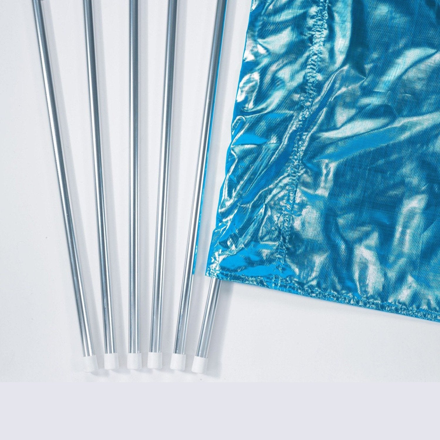 Close-up of ultra-light pole’s smooth rounded silver end cap fitted securely on anodized aluminum shaft—highlighting clean finish and safe pole terminus