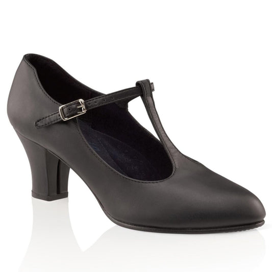 Pair of Jr. Footlight T‑Strap shoes in black and caramel, featuring tapered toe box, closed sides, and non‑slip heel with leather top lift for stability.