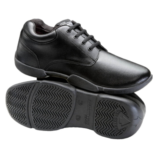 Super Drillmasters marching shoe in black full‑grain leather with lace‑up oxford styling, padded collar, cushioned tongue, and reinforced eyelets for durability during performances. Sole view of Super Drillmasters shoe featuring non‑marking rubber outsole with pivot disc, shallow flex grooves, and shallow tread pattern designed for grip on turf and gym surfaces.