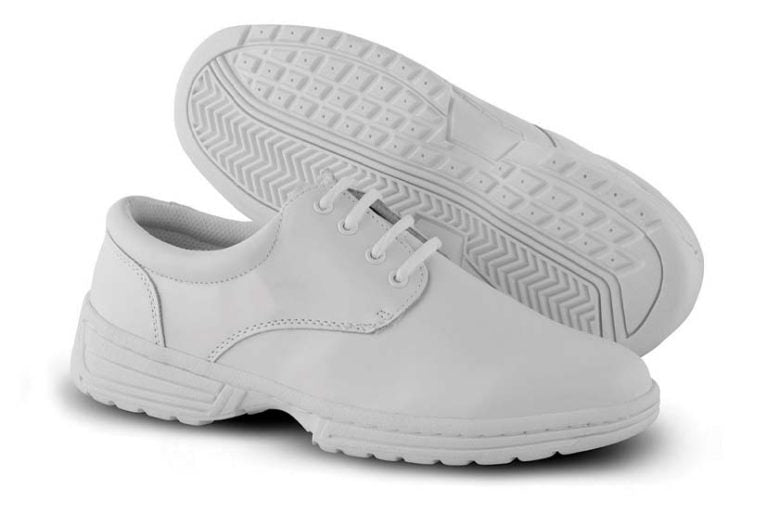MTX marching shoes in black and white, showcasing reinforced toe box, moisture-wicking lining, and rugged X‑TremeTrak sole for optimal grip on wet or dry surfaces.