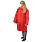 Vivace long red raincoat with Thinsulate lining, worn by model, featuring full-length front zipper with storm flap, attached hood with drawcord, and two flap pockets—designed to be worn over uniforms for insulated wet-weather protection