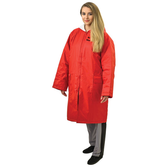 Vivace long red raincoat with Thinsulate lining, worn by model, featuring full-length front zipper with storm flap, attached hood with drawcord, and two flap pockets—designed to be worn over uniforms for insulated wet-weather protection