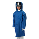 Model wearing royal-blue Vivace Dry-Pack raincoat with roomy hip-length cut, sailor-collar hood, front snap closure, elastic sleeve cuffs, and water-resistant PVC-coated Taslan shell designed to fit over marching uniforms. also available in navy, royal, red, and black
