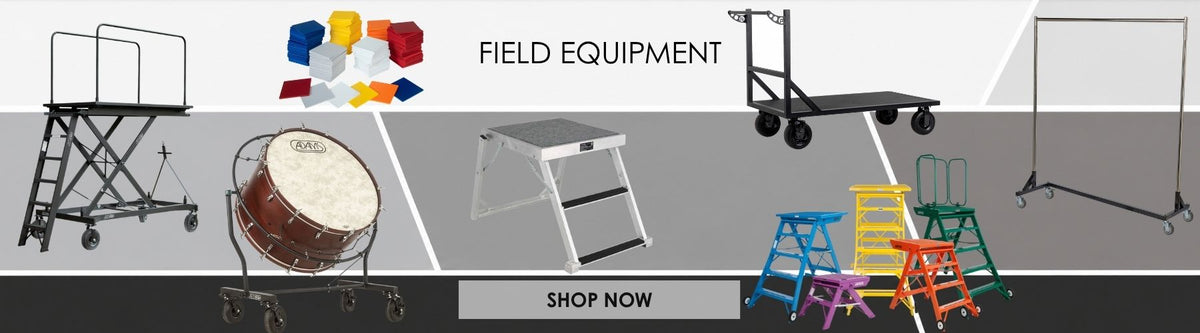 A promotional banner showing multiple pieces of field equipment, including a scissor lift, a drum, a step ladder, a dolly, and several colored folding stands, with the text 'FIELD EQUIPMENT' and a 'SHOP NOW' button.